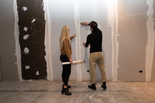 construction workers plastering finishing interior walls 651462 2736